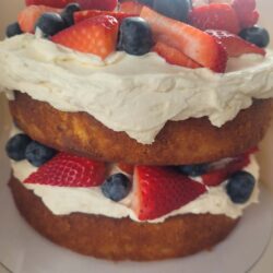 Lemon Cake with Whipped Cream Cheese Cream Icing and Berries